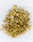 A close up of loose Dreamy C tea on a white background.
