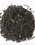 Loose Leaf Tea Co. Earl Grey features loose black tea leaves with blue flower petals, offering a creamy, classic flavor that’s perfect for enjoying all day.