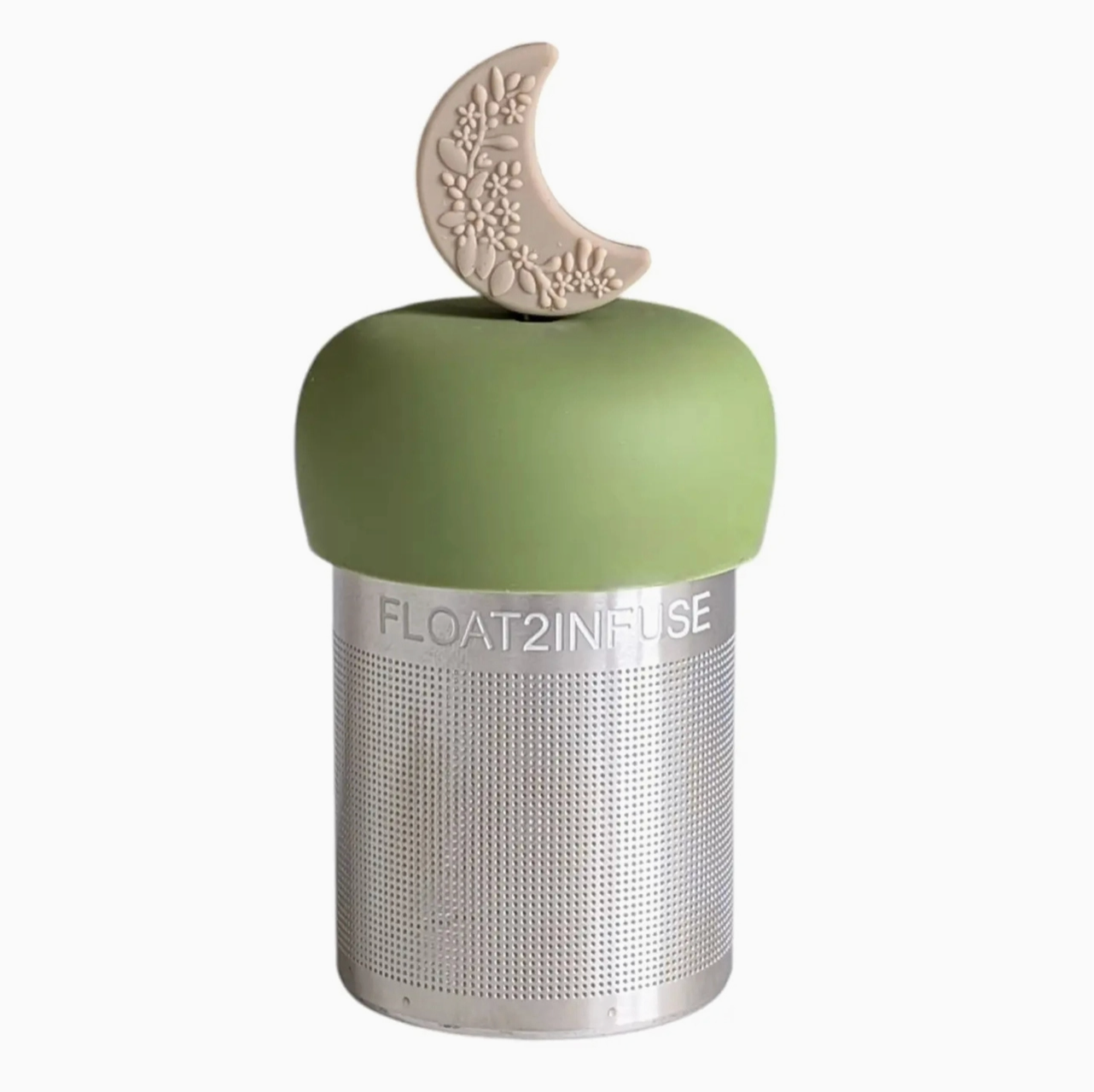 Green tea infuser with floral moon design on a white background