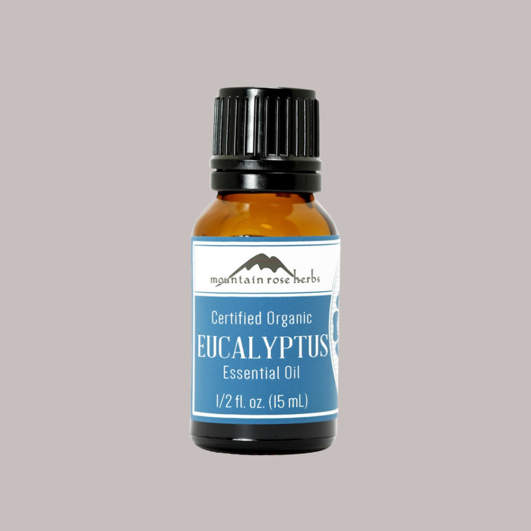 A 1/2 fl. oz. (15 mL) amber bottle of Mountain Rose Herbs Eucalyptus Essential Oil with a black cap sits on a light gray background—ideal for supporting healthy breathing.