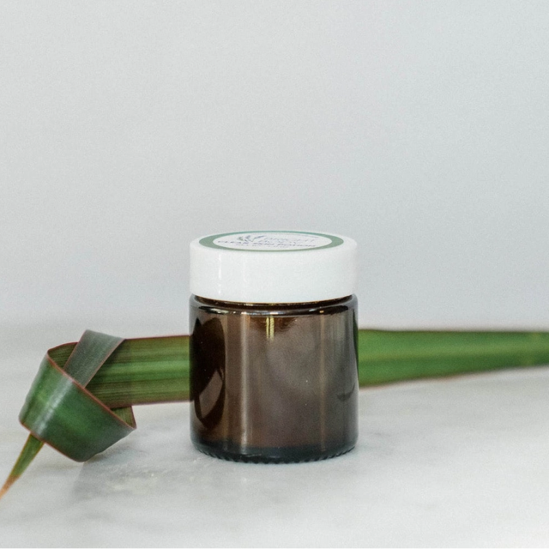 The Bright Body Clear Skin Potion Jar sitting right side up on a white background.  