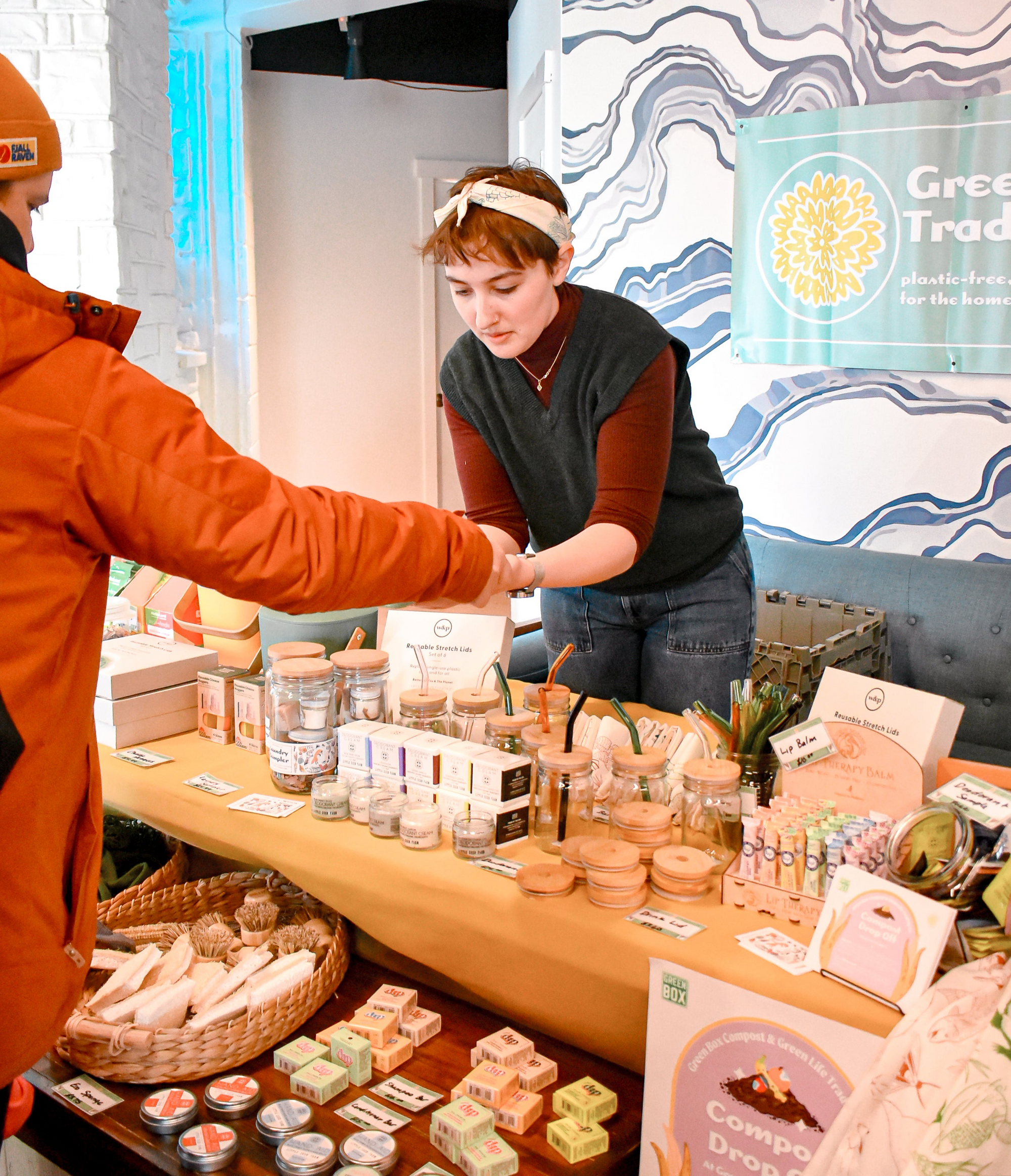 woman checking out person at market