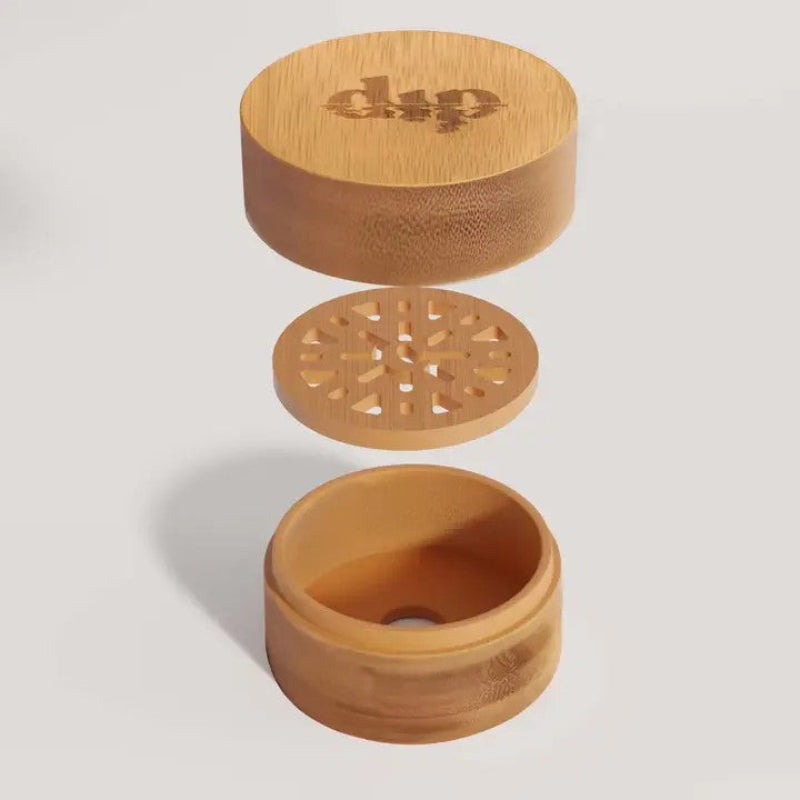 Mini Dip travel Case with each part suspended in the air. 