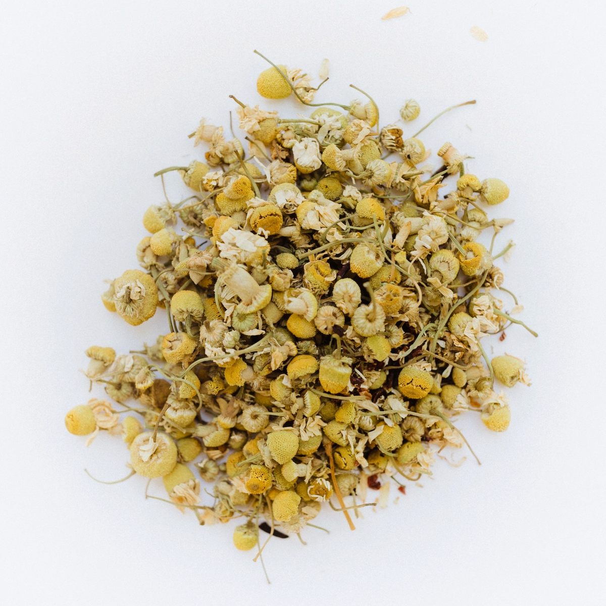 A close up of loose  Dreamy C tea on a white background. 