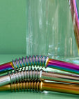 A close up on the bendable section of the reusable bendy metal straw. 