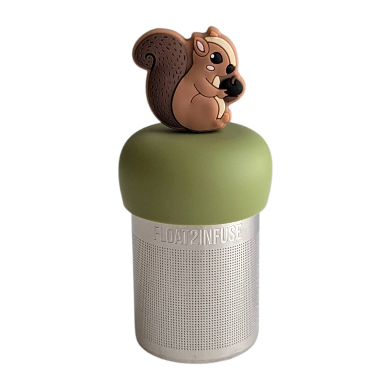 A Stainless steel and silicone floating tea infuser. The top silicone part is green with a cute brown squirrel charm on top of it.