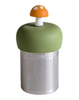 A Stainless steel and silicone floating tea infuser. The top silicone part is green with a cute yellow mushroom charm on top of it.