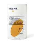 A white paper deodorant tube with a orange oval hibar branding on it in the Bergamot and cedar scent. 