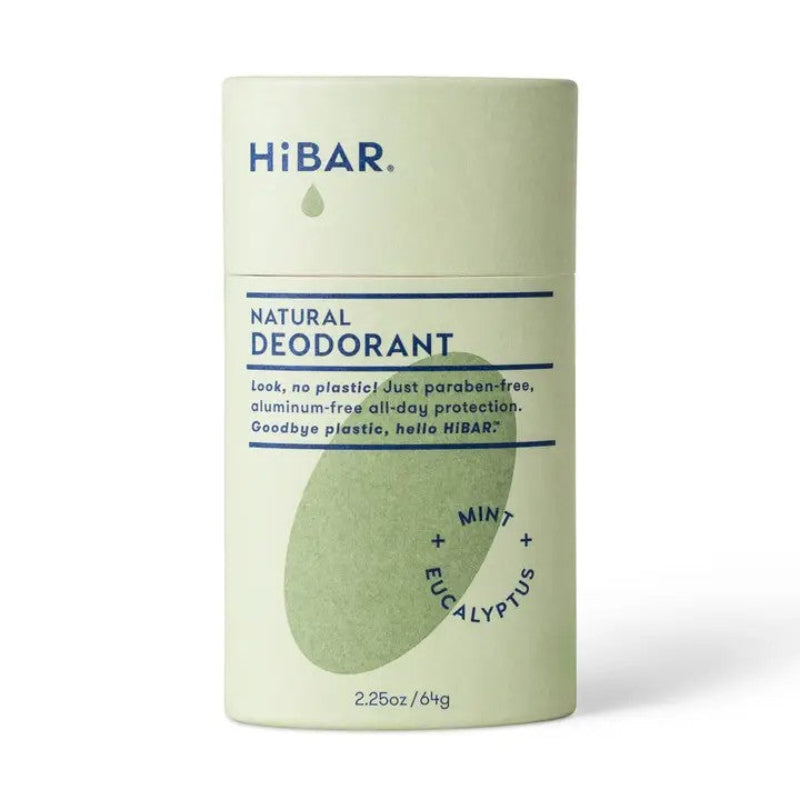 A green paper deodorant tube with a green oval hibar branding on it in the Eucalyptus and mint scent. 