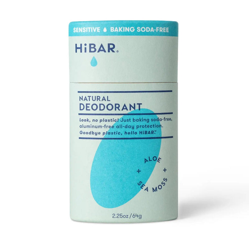 A blue paper deodorant tube with a blue oval hibar branding on it in the aloe and sea moss scent in the sensitive formula. 