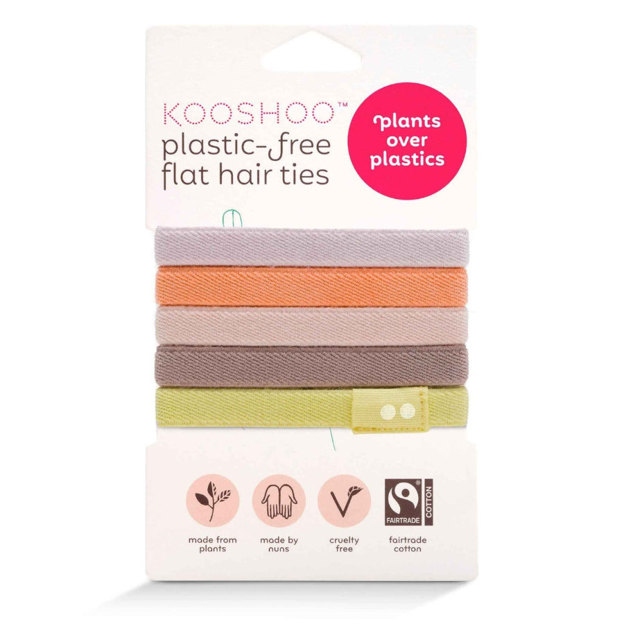 A pack of KooShoo Biodegradable Hair Ties in earthy springy shades, shown on white packaging that emphasizes their eco-friendly, plant-based, and plastic-free materials.