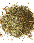 A small pile of loose leaf lemon blend tea. 
