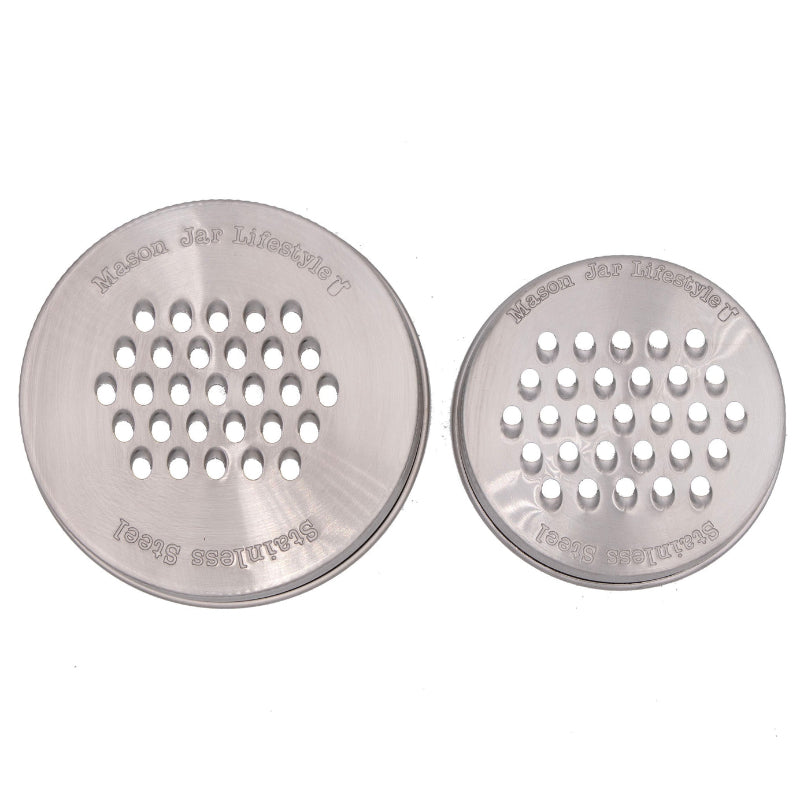 The wide mouth and the regular mouth grater mason jar lids on a white background. 