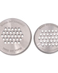 The wide mouth and the regular mouth grater mason jar lids on a white background. 
