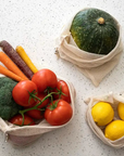 Organic produce in mesh bag on countertop