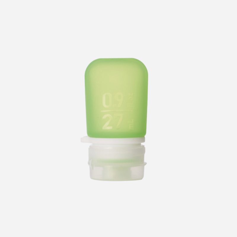 The extra small 0.9 oz silicone squeeze tube in the color green. 