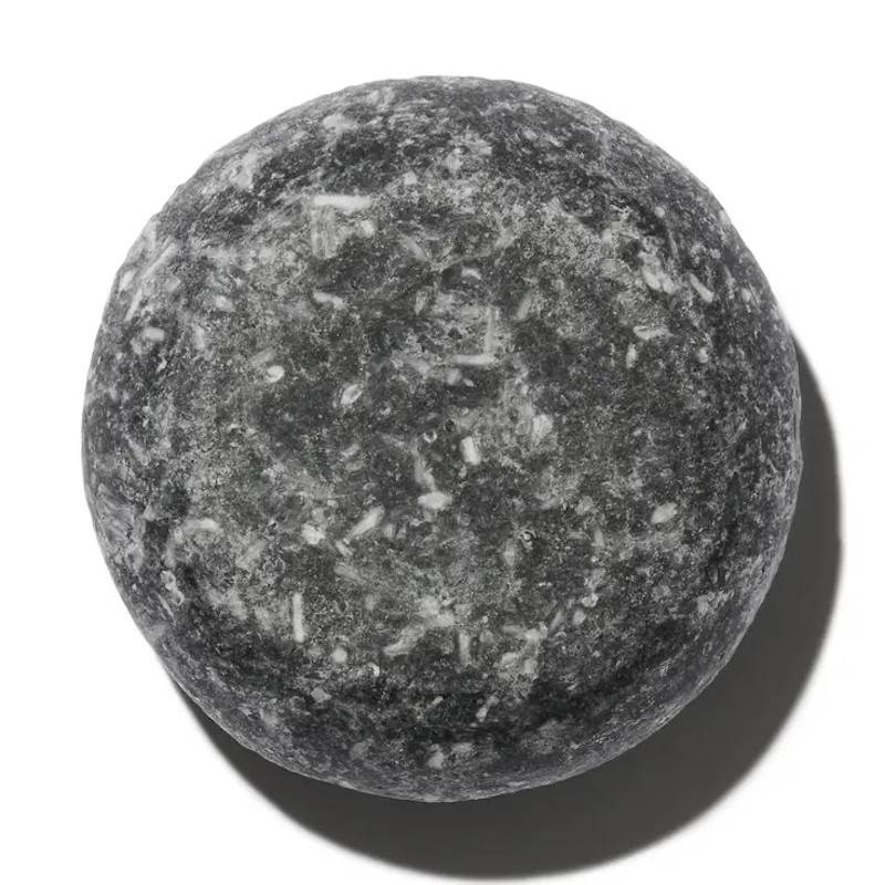 Round stone ball on a white background