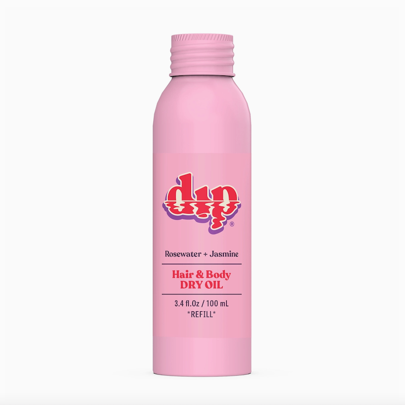 Pink metal bottle of hair and body dry oil and perfume 