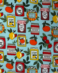 The Jams and Jars Paperless Towel Pattern featuring jars of jams and citrus fruits on a blue background. 