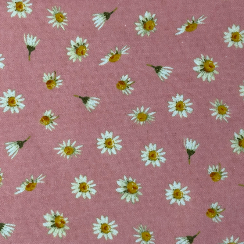 The Pink Daisy Paperless towel pattern featuring white daisies on a pink background.