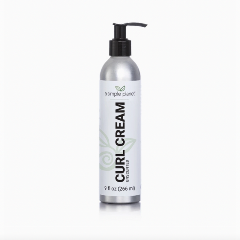 A silver bottle of A Simple Planet Curl Cream Unscented with a black pump top, featuring Organic Flaxseed for defined curls, contains 9 fl oz (266 ml) and is shown against a white background.
