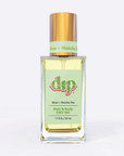 Square glass bottle with gold top and green label says rose matcha hair and body dry oil on white background