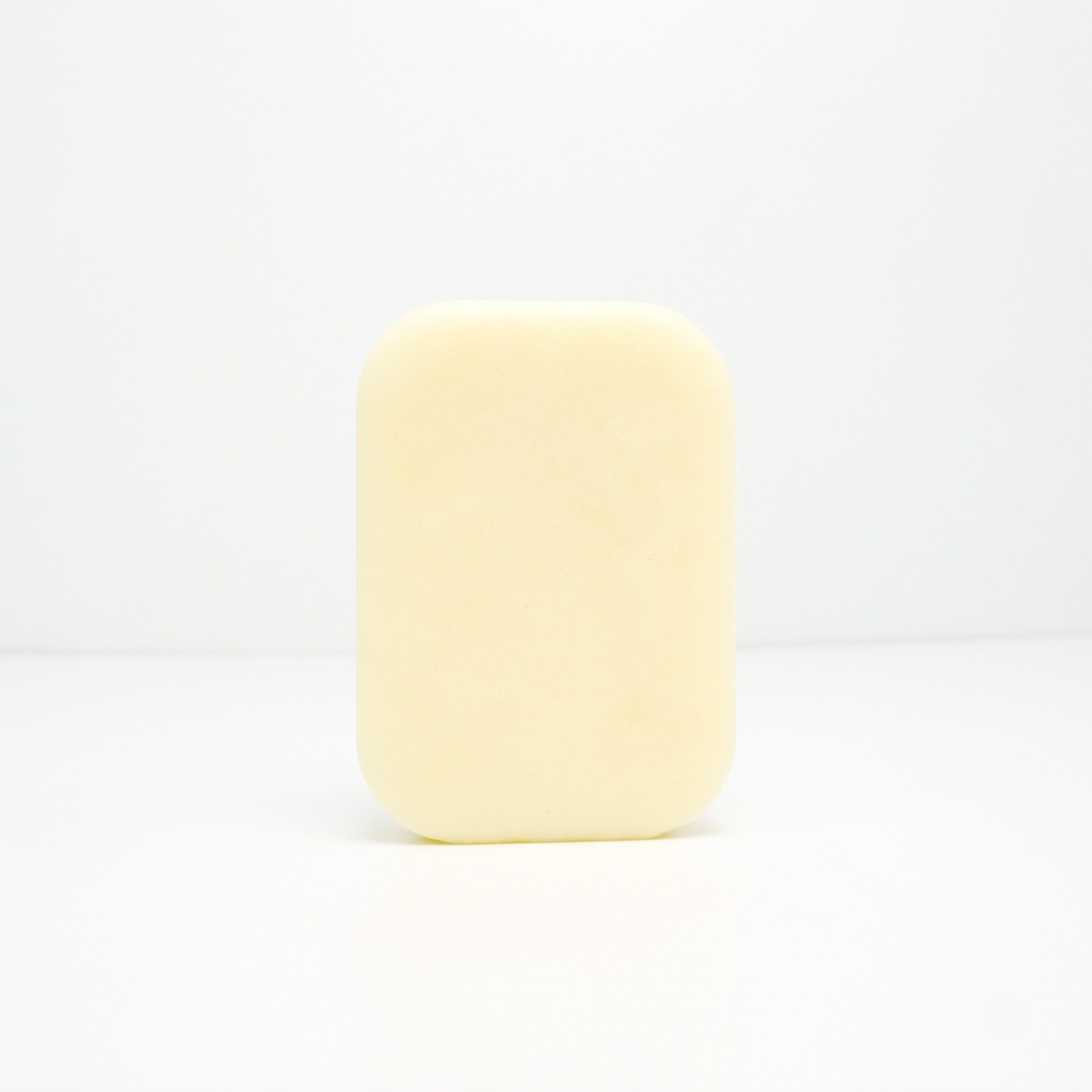 white lotion bar on white background