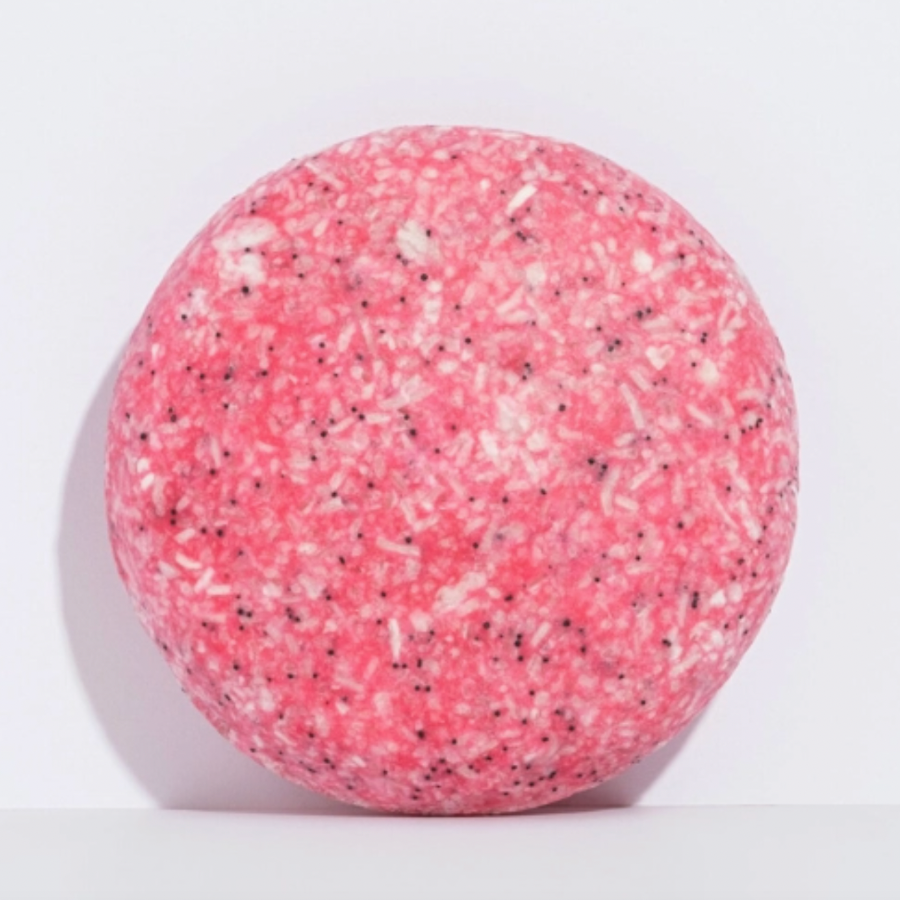 pink shampoo bar on white backdrop 