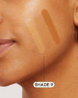 Medium skinned woman featuring medium foundation swatched on cheek