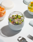 bean salad in medium lunch bowl on white background