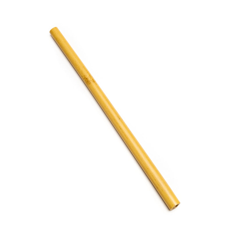 A single reusable bamboo straw on a white background. 