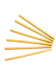 An array of reusable and compostable bamboo straws on a white background. 