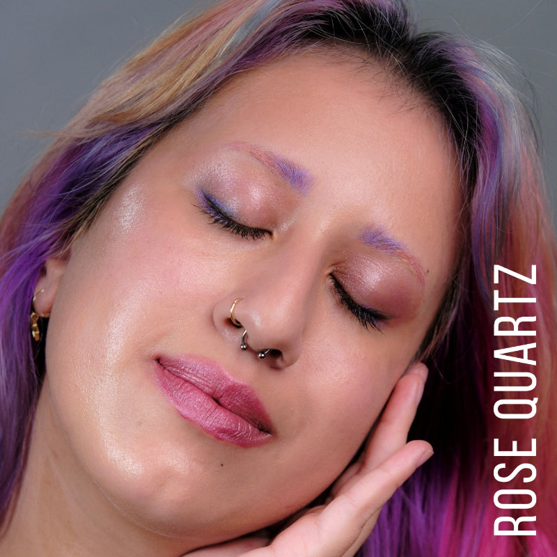 A model wearing the skin tint in the shade Rose Quartz