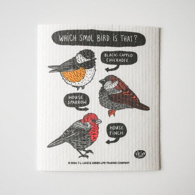 The Potluck Press Swedish Dishcloth features an illustrated chart titled Which Smol Bird Is That? with labeled drawings of a black-capped chickadee, house sparrow, and house finch.