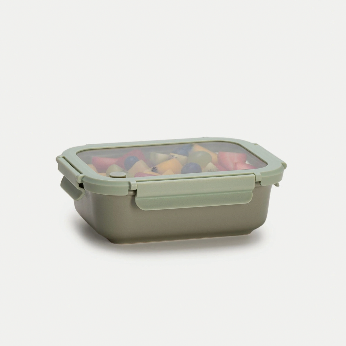 Rectangular food storage container with a transparent lid on a light gray background
