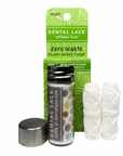 Dental Lace Vegan Compostable Floss features PLA floss in a metal-capped glass container, includes two refill spools, and comes in vegan, zero-waste, refillable packaging.