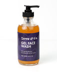 A clear bottle with a black pump, labeled Zerra & Co. Gel Face Wash, contains orange gel face wash ideal for fragrance-free skincare routines.