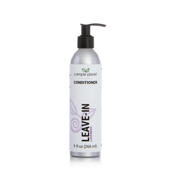 A 9 fluid oz container of a simple planet plant based refillable leave in conditioner. It is in an aluminum pump bottle with a white and purple label. 
