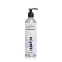 A 9 fluid oz container of a simple planet plant based refillable leave in conditioner. It is in an aluminum pump bottle with a white and purple label. 