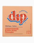 orange  box of Dip conditioner bar for all hair types scented wild sage vetiver on white backdrop. 