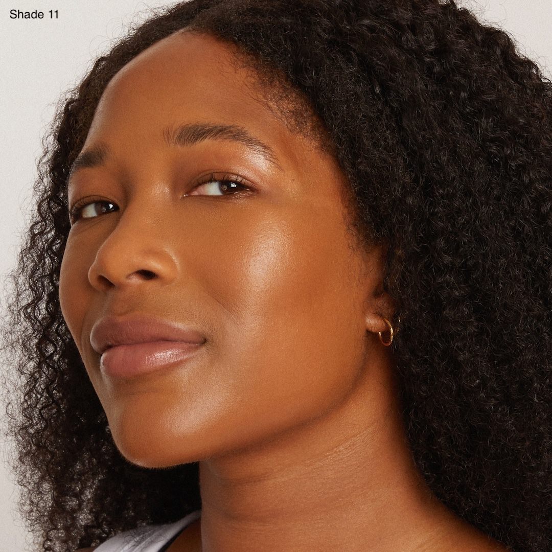 Medium dark skinned woman featuring medium dark foundation 