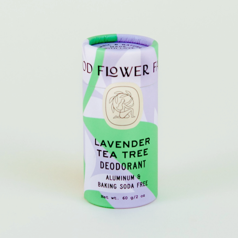 A 60g (2 oz) cylindrical Deodorant Stick by Good Flower Farm with green, purple, and white packaging, labeled aluminum and baking soda free.