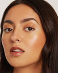 Medium skinned woman featuring medium foundation 