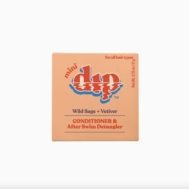 orange box of plastic free conditioner bar on white backgrop