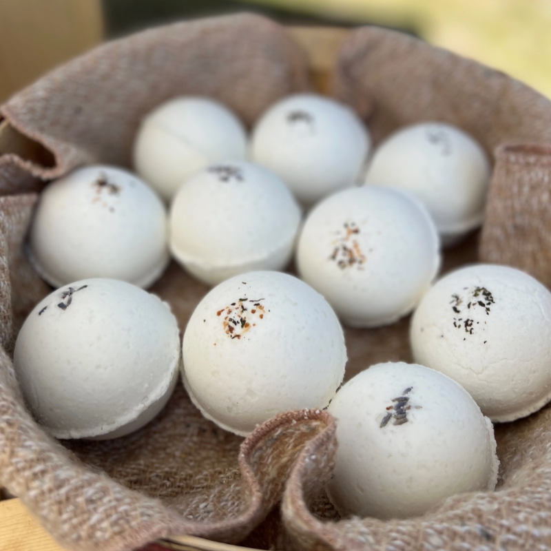 brown basket of white bath bombs