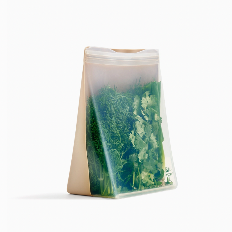 tan and clear silicone bag with herbs inside