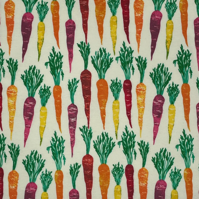 Multi colored carrot pattern on a white fabric paperless towel