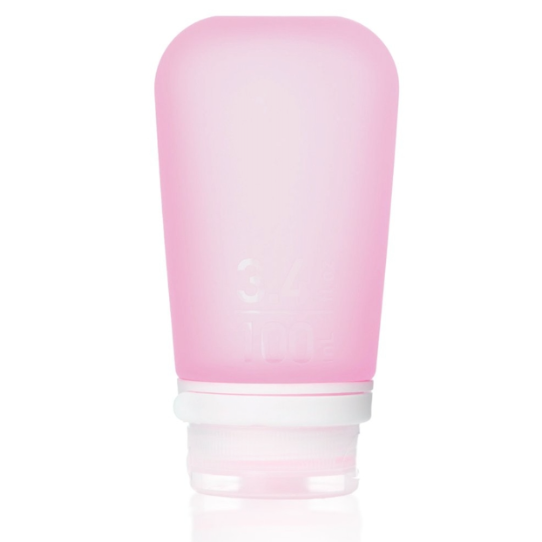 A large 3.4 oz silicone bottle in the color pink on a white surface. 
