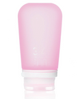 A large 3.4 oz silicone bottle in the color pink on a white surface. 
