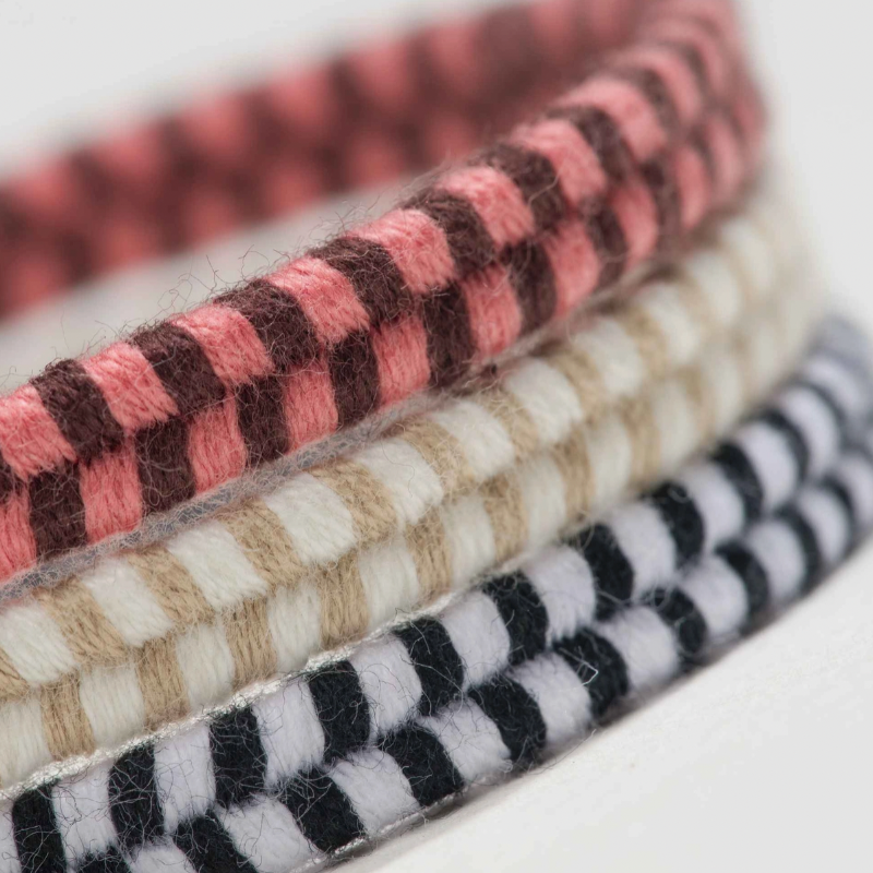 close up image of woven hair ties